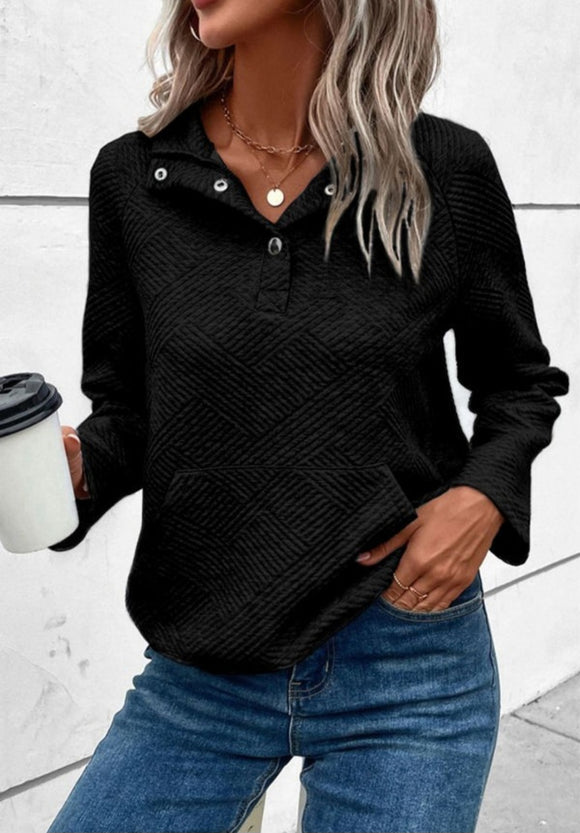 Black textured sweater, with pocket.